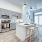 open kitchen with island and under cabinet lighting